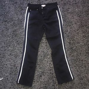 Black jeans with white stripes